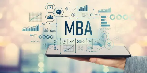 Gráficos y datos financieros sobre una pantalla de tablet, con el texto "MBA" en el centro. Ideal para un curso de mba finanzas.