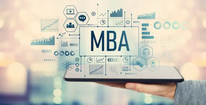 Gráficos y datos financieros sobre una pantalla de tablet, con el texto "MBA" en el centro. Ideal para un curso de mba finanzas.